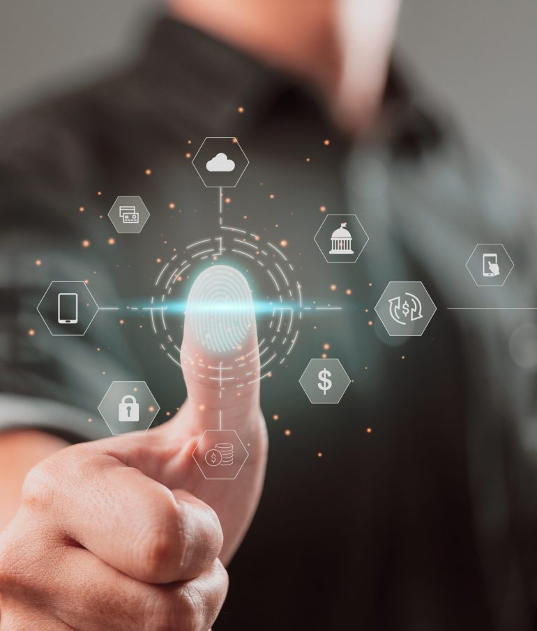 Security of personal financial data are all concepts. A guy uses a mobile banking app with face ID and a future technology interface to scan his fingerprints.